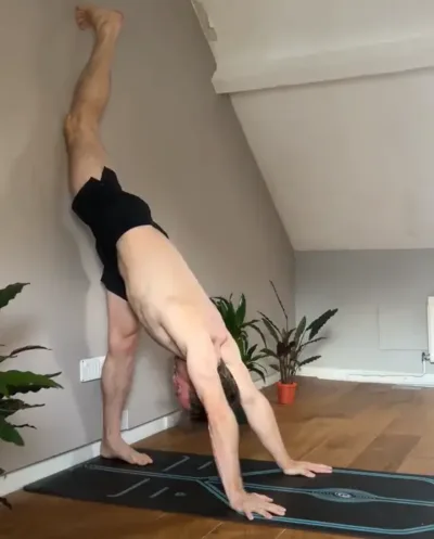 Standing Splits Against the Wall